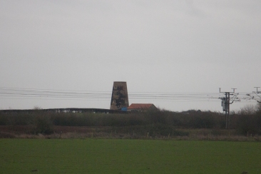The imposing windmill tower at Appleton Roebuck glimpsed from the train, house converted since my last visit...